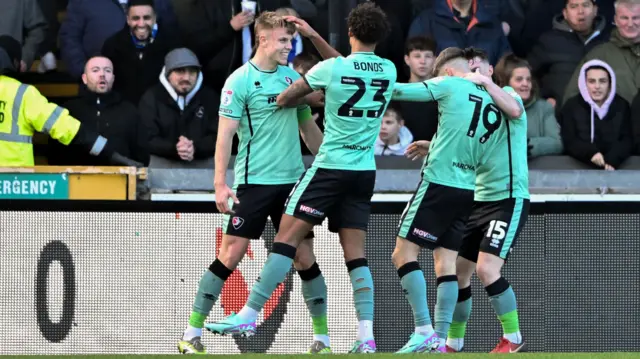 Will Goodwin of Cheltenham Town celebrates scoring the opening goal