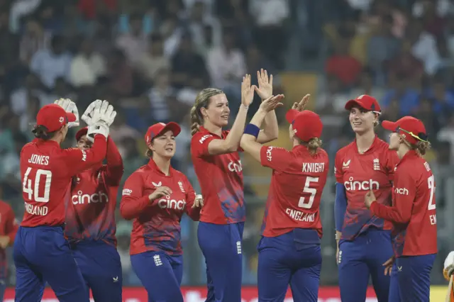 Lauren Bell celebrates a wicket