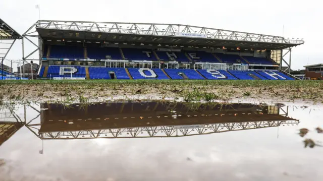 Puddles by the side of the pitch at Peterborough v Oxford