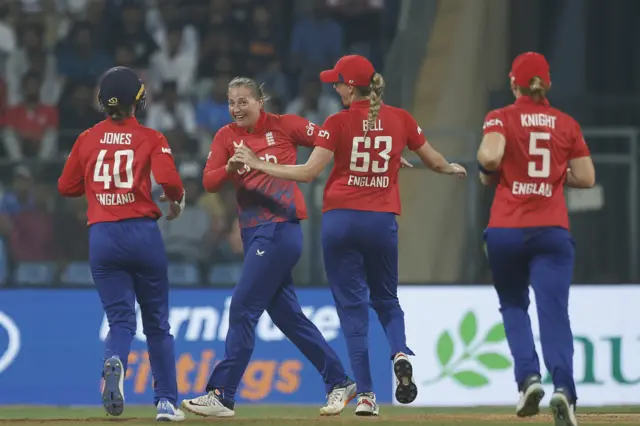 England's Sophie Ecclestone celebrates taking a wicket