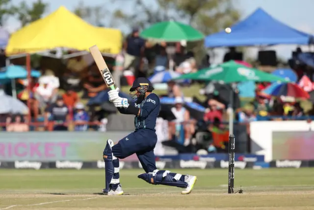 Adil Rashid hits a six