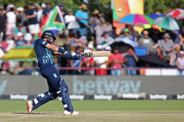 Moeen Ali hits a six