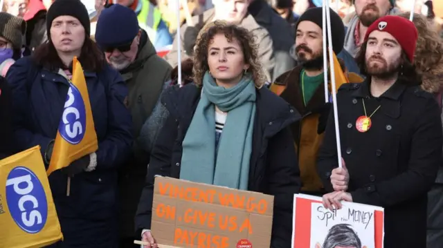 Members of the Public and Commercial Services Union (PCS) attend a rally at the Mound, in Edinburgh