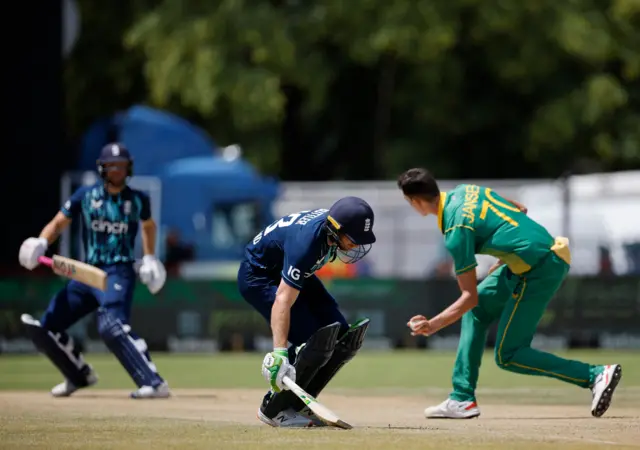 Marco South Africa's Marco Jansen (R) prepares to throw the ball as England's Captain Jos Buttler (C) grounds his bat and England's Dawid Malan (L) turns to make his ground during the third one day international (ODI) cricket match between South Africa and England at Mangaung Oval in Kimberley