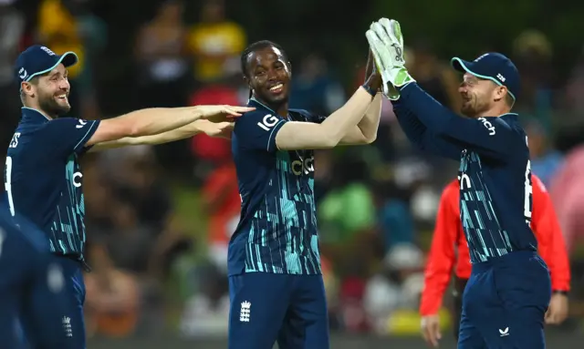 Jofra Archer celebrates taking five wickets with Jos Buttler and Chris Woakes