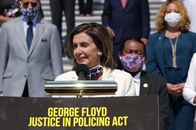 Nany Pelosi at podium