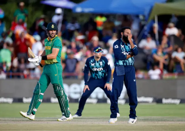 Adil Rashid looks disappointed after conceding a boundary