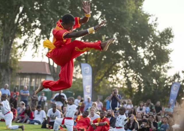 A boy takes a leap on Saturday at an event to celebrate the Lunar New Year in the South African city of Johannesburg.