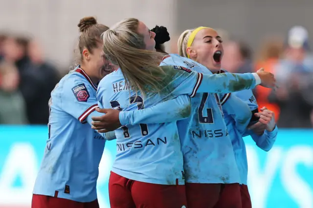 Manchester City, Arsenal, WSL