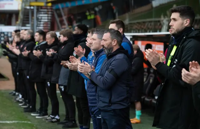 Derek McInnes applauds