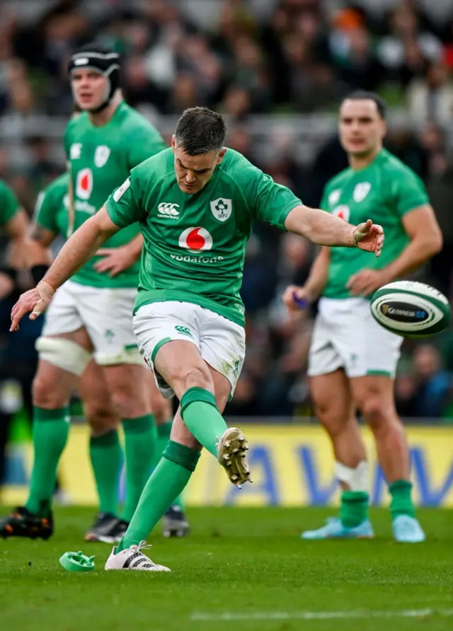 Johnny Sexton kicking a penalty.