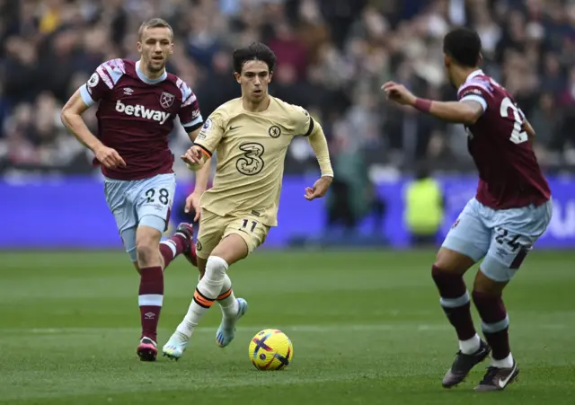 Chelsea's Joao Felix in action with West Ham United's Tomas Soucek and Thilo Kehrer