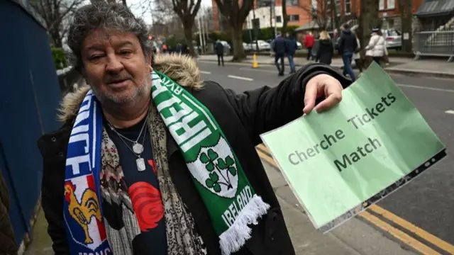 A French supporter outside the ground.