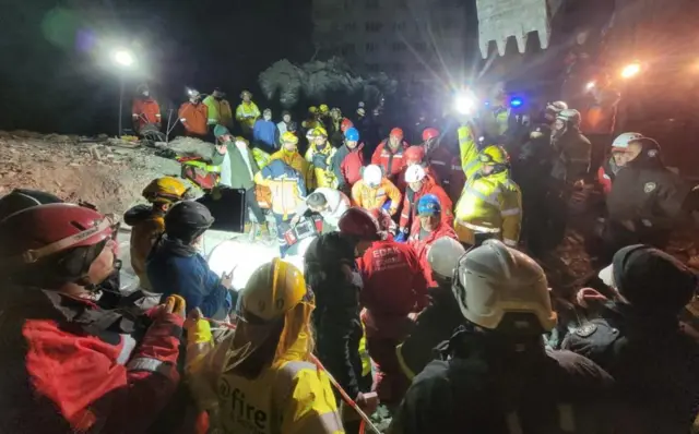 Rescue teams take part in the rescue of a 15-year-old girl in Kahramanmaras, Turkey