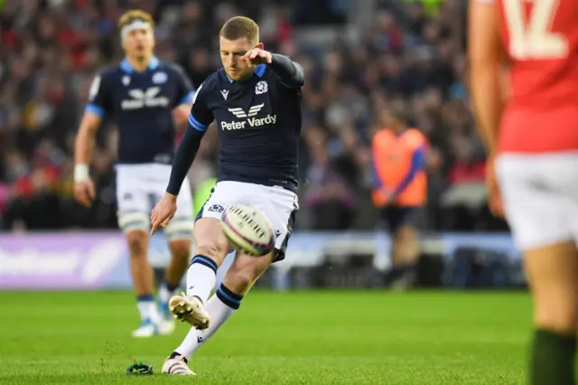 Russell kicks Scotland in front