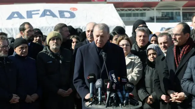 Turkish President Tayyip Erdogan talks to media in the aftermath of a deadly earthquake in Kahramanmaras