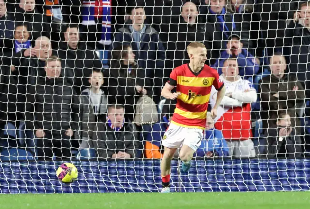 Partick Thistle's Scott Tiffoney scores