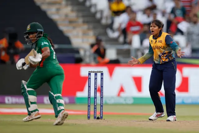 Sri Lanka's Oshadi Ranasinghe reacts as Bangladesh's Shamima Sultana runs between the wickets