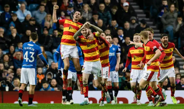 Partick Thistle celebrate taking an unlikely lead at Ibrox