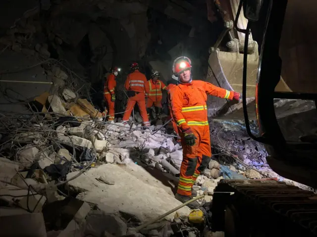 Members of the UK's International Search & Rescue team at work in Hatay, Turkey,