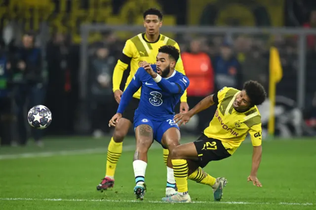 Reece James tackles Karim Adeyimi for which he receivers a yellow card.