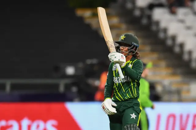 Muneeba Ali celebrates hitting a half-century against Ireland