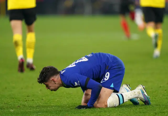 Kai Havertz stays down after a tackle from Niklas Sule