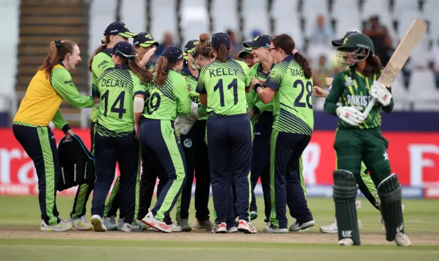 Players of Ireland celebrate the wicket of Javeria Wadood of Pakistan during the ICC Women's T20 World Cup group B match between Pakistan and Ireland at Newlands Stadium on February 15, 2023 in Cape Town, South Africa