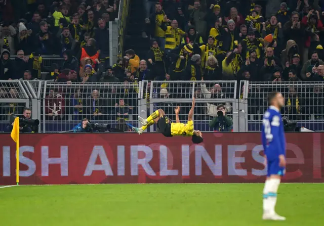 Karim Adeyemi celebrates his goal with a somersault