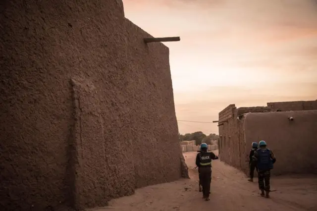 Police officers of the United Nations Stabilisation Mission in Mali (MINUSMA) secure access to the Great Mosque in Timbuktu, on December 9, 2021.