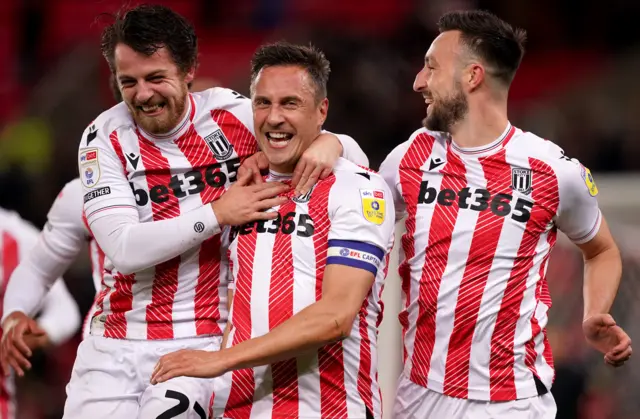 Phil Jagielka celebrates scoring for Stoke against Huddersfield