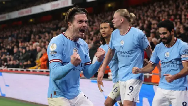 Jack Grealish celebrates with his Manchester City team-mates