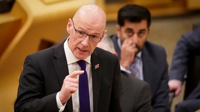 Deputy First Minister John Swinney delivers a budget statement to the Scottish Parliament