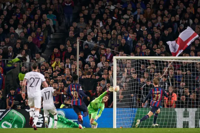 Andre Ter Stegen saves Marcus Rashford's shot.