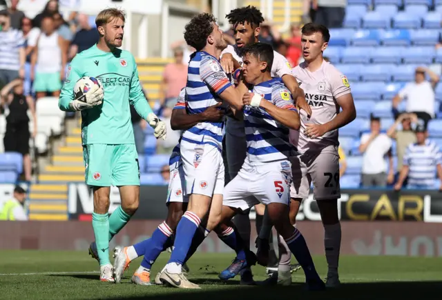 Reading v Cardiff, August 2022, players squaring up to each other