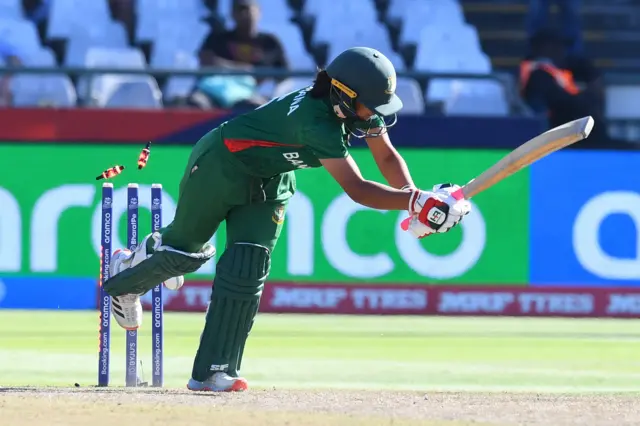 Bangladesh's Sobhana Mostary is bowled by New Zealand's Hannah Rowe (not seen) during the Group A T20 women's World Cup cricket match between New Zealand and Bangladesh at Newlands Stadium in Cape Town