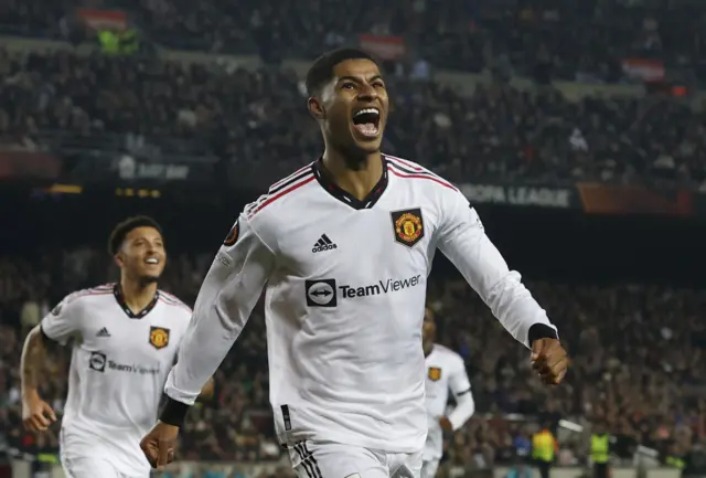 Marcus Rashford celebrates scoring in the Nou Camp