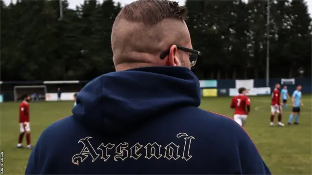 Marc Brewer - an Arsenal fan - watches Dial Square FC