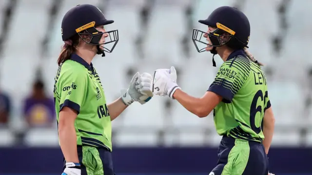 Gaby Lewis and Orla Prendergast of Ireland interact during the ICC Women's T20 World Cup group B match between West Indies and Ireland at Newlands Stadium