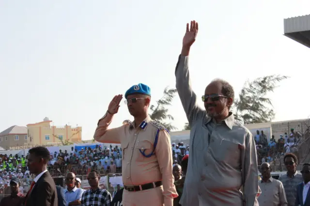 Somalia's President Hassan Sheikh Mohamud (r) attends a rally against the al-Qaeda-affiliated terror group al-Shabaab in Mogadishu on January 12, 2023.