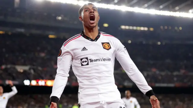 Marcus Rashford celebrates scoring in the Nou Camp