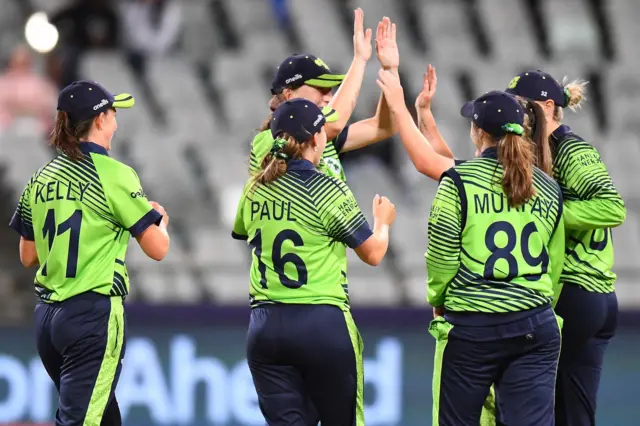 Ireland players celebrate the dismissal of West Indies' Shemaine Campbelle (not seen) during the Group B T20 women's World Cup cricket match between West Indies and Ireland at Newlands Stadium in Cape Town