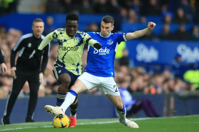 Leeds forward Wilfried Gnonto vies with Everton defender Seamus Coleman