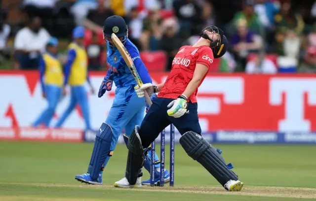 Nat Sciver-Brunt of England reacts after missing the ball during the ICC Women's T20 World Cup group B match between England and India at St George's Park