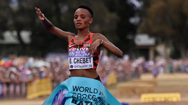 Kenya's Beatrice Chebet crosses the line