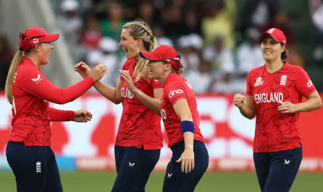 Lauren Bell and England celebrate the wicket of India's Shafali Verma