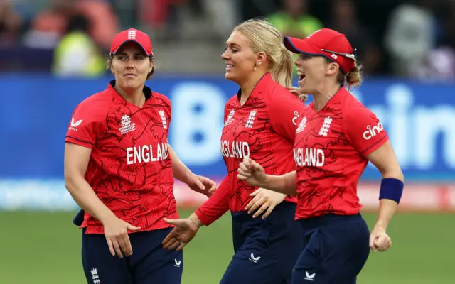 Sarah Glenn and England celebrate the wicket of Jemimah Rodrigues