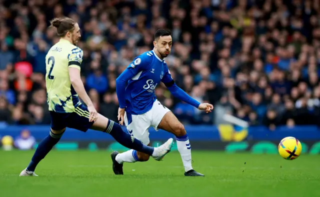 Everton's Dwight McNeil in action with Leeds United's Luke Ayling