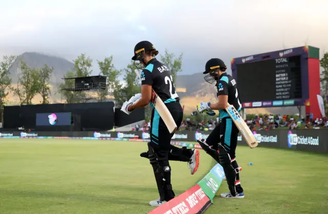 Suzie Bates and Bernadine Bezuidenhout of New Zealand make their way out to bat during the ICC Women's T20 World Cup group A match between New Zealand and Sri Lanka at Boland Park