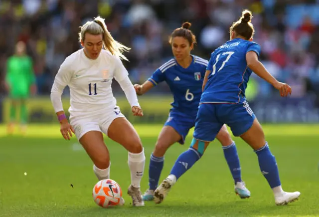 Lauren Hemp in action for England